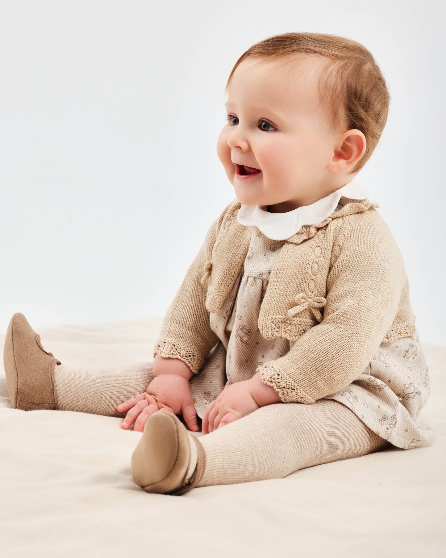 Cozy Sand Knit Baby Cardigan with Lace Trim & Bow Accents