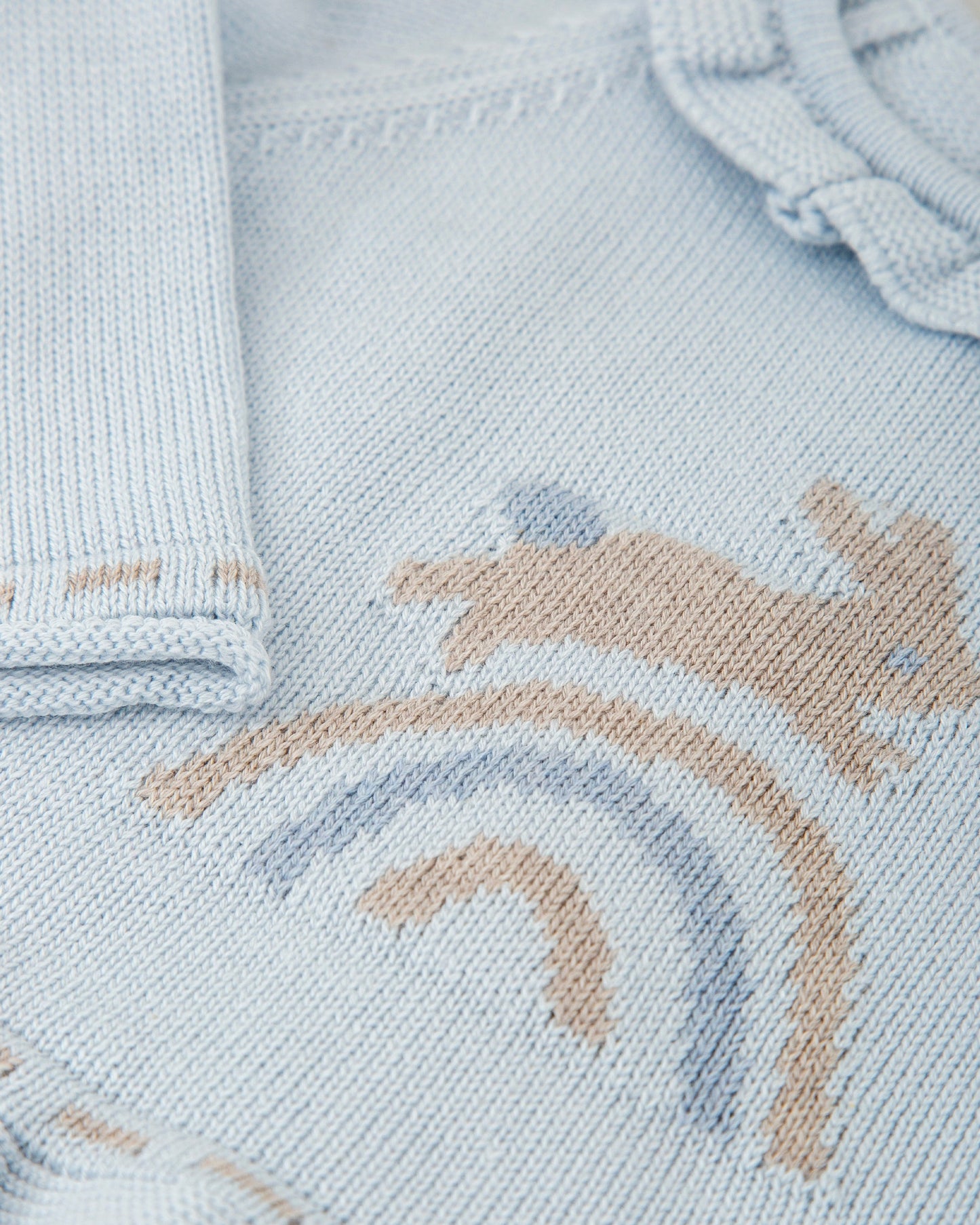 Cozy Baby Girl Blue Knit Sweater with Bunny & Ruffle Details